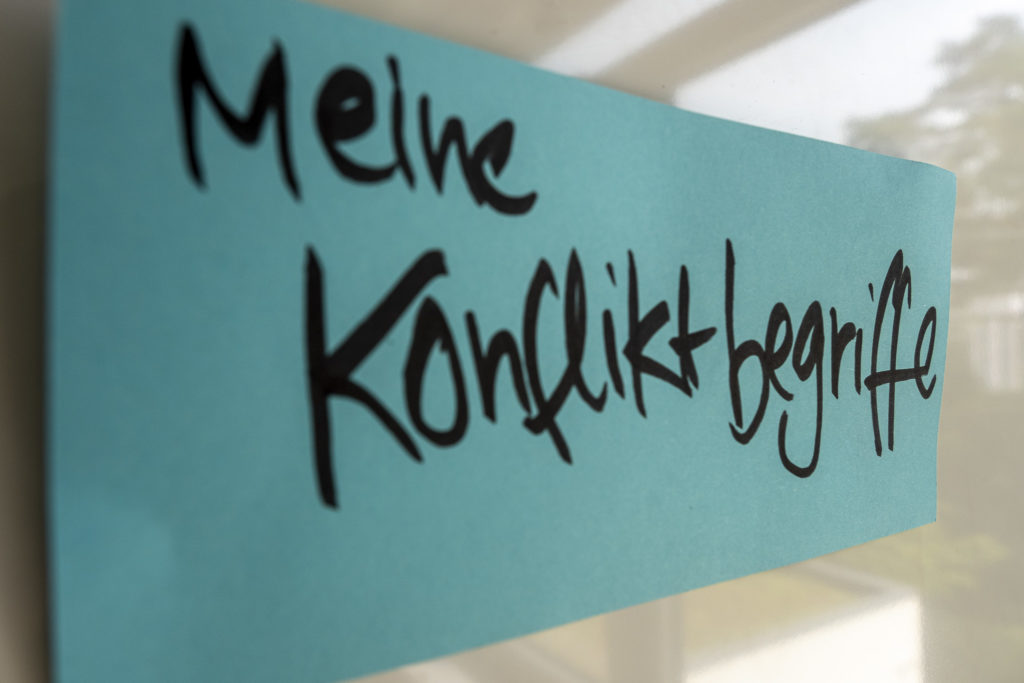 Symbolbild Konfliktbegriffe